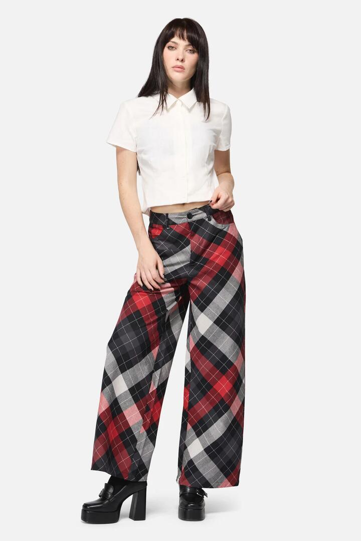Image of a model wearing Pants. Productname: Trickster Goth Pant in Multi colour by brand - Dangerfield