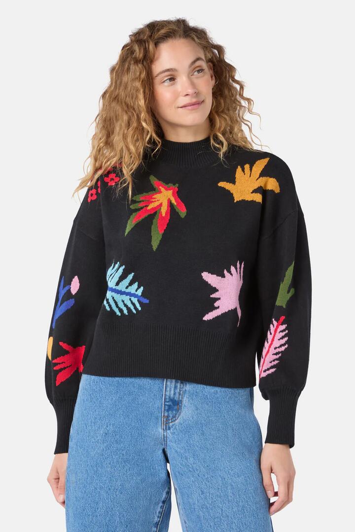 Image of a model wearing Outerwear. Product name - Night Garden Motif Jumper in Black colour by brand - Gorman