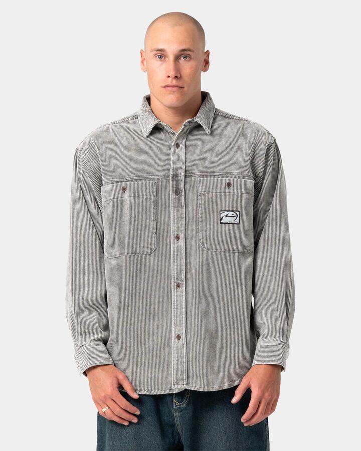 Image of a model wearing Tops. Product name - Rusty Mens Cobra Washed Over Long Sleeve Shirt Oyster Grey in Oyster Grey colour by brand - Rusty