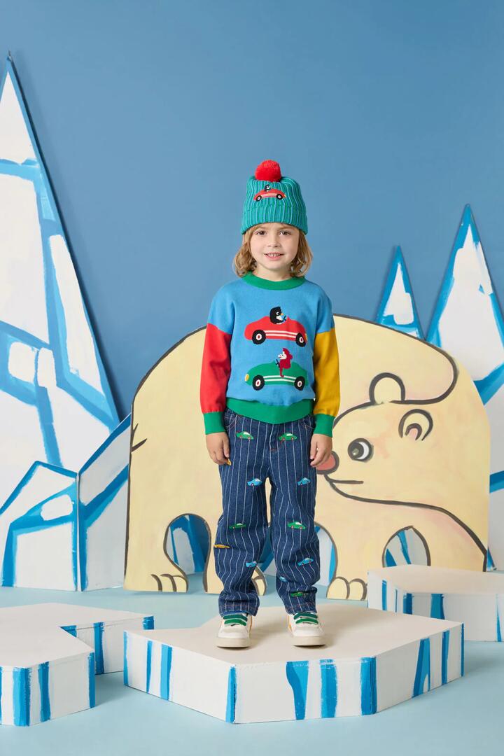 Image of a model wearing Tops. Product name - Drivers Kids Knit Jumper in Multi colour by brand - Gorman
