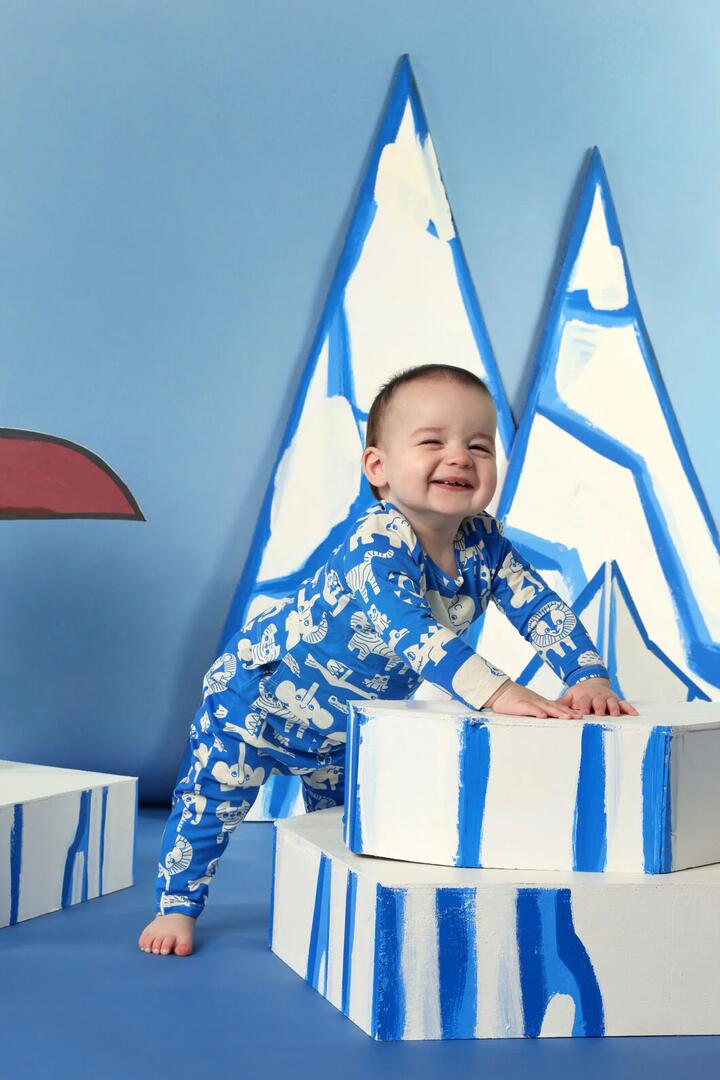 Image of a model wearing Pants. Product name - Soft Animal Baby Legging in Blue colour by brand - Gorman