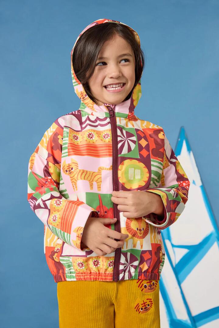 Image of a model wearing Rain Coats. Product name - Abstract Circus Kids Raincoat in Multi colour by brand - Gorman