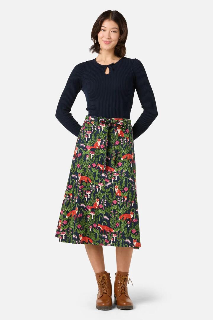 Image of a model wearing Skirts. Productname: Fancy Foxes Midi Skirt in Navy colour by brand - Princess Highway