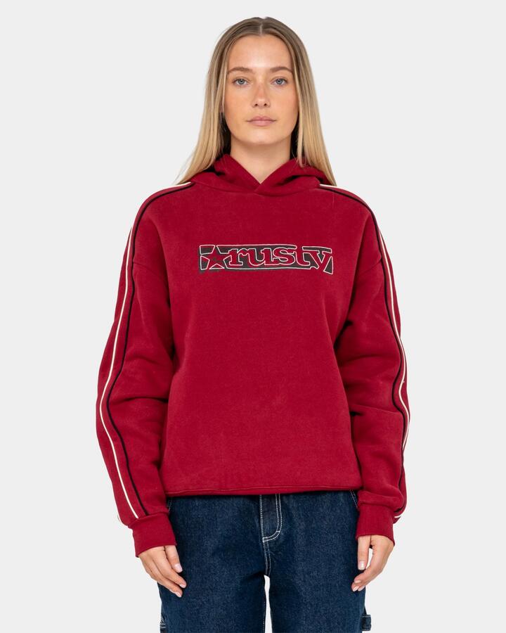 Image of a model wearing Outerwear. Product name - Rusty Womens Red Raw Archival Oversized Pullover Hoodie Red in Red colour by brand - Rusty