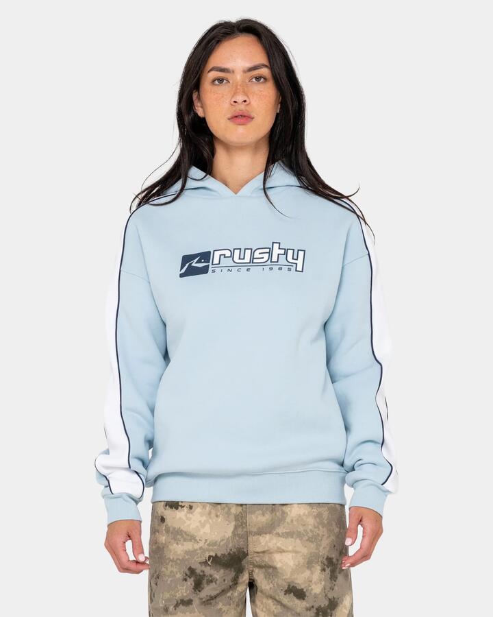 Image of a model wearing Outerwear. Product name - Rusty Womens Hailstone Oversized Pullover Hoodie Retro Blue in Retro Blue colour by brand - Rusty