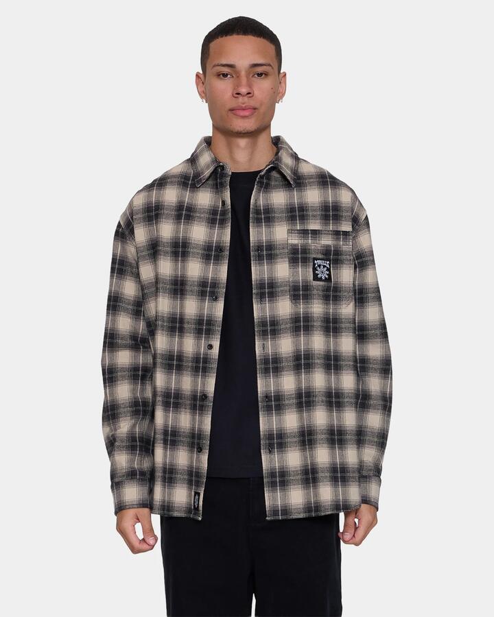 Image of a model wearing Tops. Product name - Thrills Mens Stagger Barrio Long Sleeve Flannel Shirt Black in Black colour by brand - Thrills