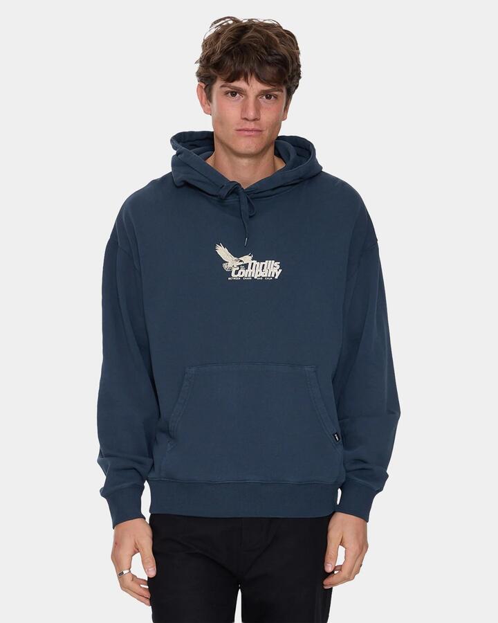 Image of a model wearing Outerwear. Product name - Thrills Mens Between Chaos & Calm Slouch Pullover Hoodie Federal Blue in Federal Blue colour by brand - Thrills