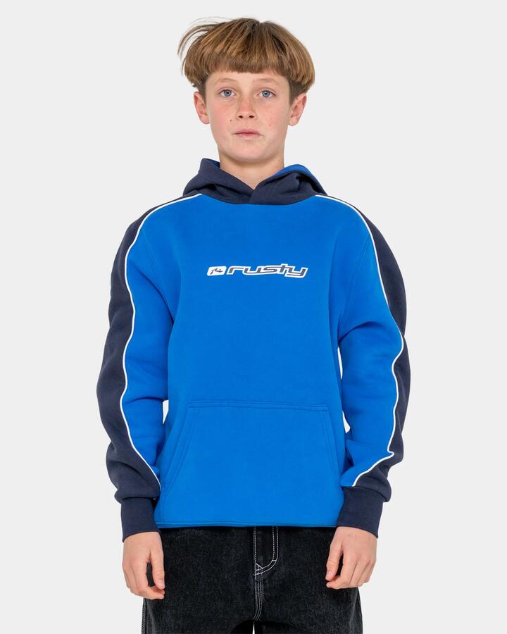 Image of a model wearing Outerwear. Product name - Rusty Boys 8-16 Panela Anderson 2.0 Pullover Hoodie Royal Blue in Royal Blue colour by brand - Rusty