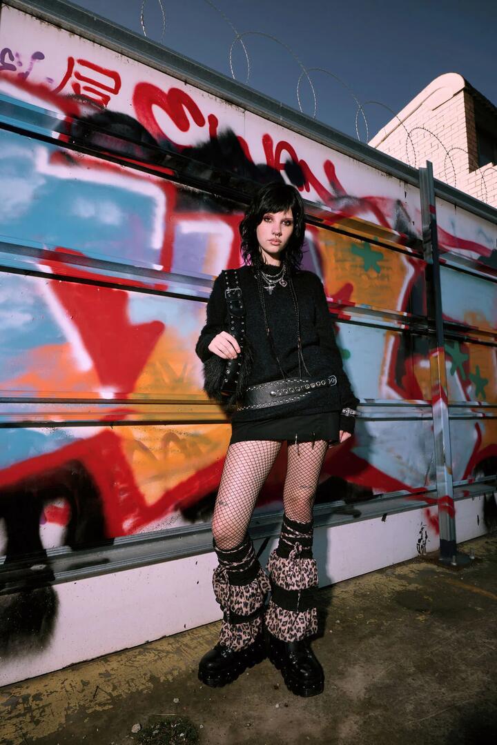 Image of a model wearing Outerwear. Productname: Diffused Fluffy Knit Jumper in Black colour by brand - Dangerfield