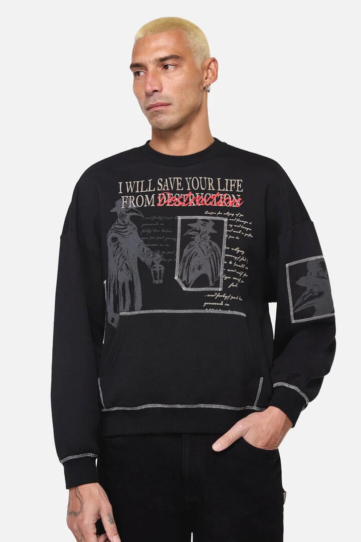 Image of a model wearing Outerwear. Productname: Plague Doctor Patch Jumper in Black colour by brand - Black Friday