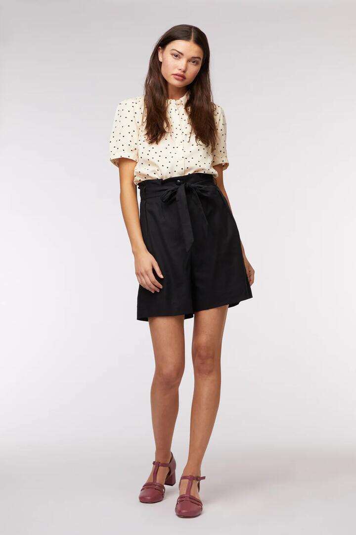 Image of a model wearing Shorts. Productname: Ruby Shorts in Ginger colour by brand - Princess Highway