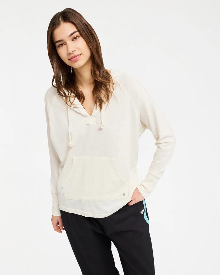 Image of a model wearing Outerwear. Product name - Roxy Womens Destination Surf Pullover Hoodie Egret in Egret colour by brand - Roxy