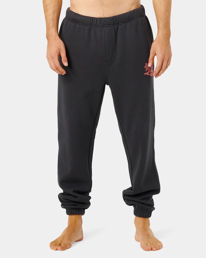 Image of a model wearing Pants. Product name - Rip Curl Mens Liquid Trips Track Pants Washed Black in Washed Black colour by brand - Rip Curl