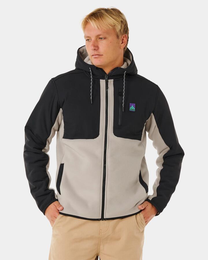Image of a model wearing Outerwear. Product name - Rip Curl Mens Anti Series Search Zip Up Hoodie Stone in Stone colour by brand - Rip Curl