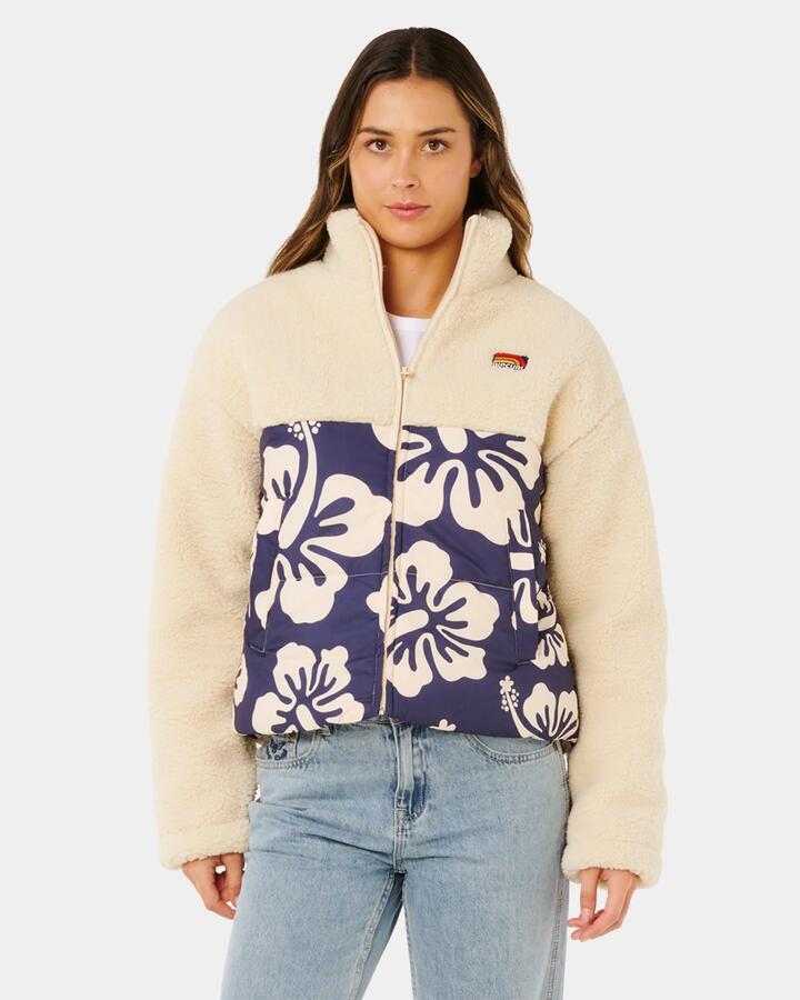Image of a model wearing Outerwear. Product name - Rip Curl Womens Surf Side Puffer Fleece Jacket Navy in Navy colour by brand - Rip Curl
