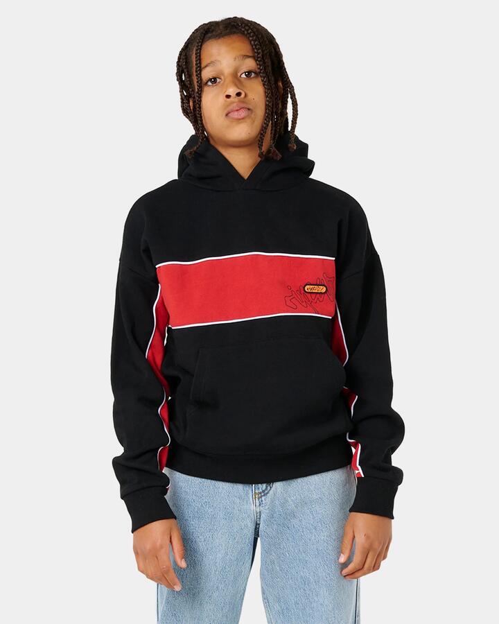 Image of a model wearing Outerwear. Product name - Rip Curl Boys 8-16 Panel Beater Fleece Pullover Hoodie Black in Black colour by brand - Rip Curl