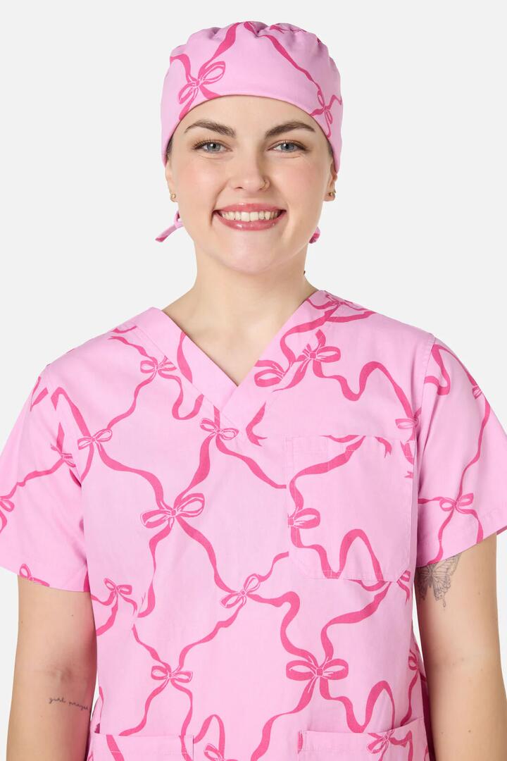 Image of Hats. Productname: Pink Bows Scrub Hat in Pink colour by brand - Scrubs With Love