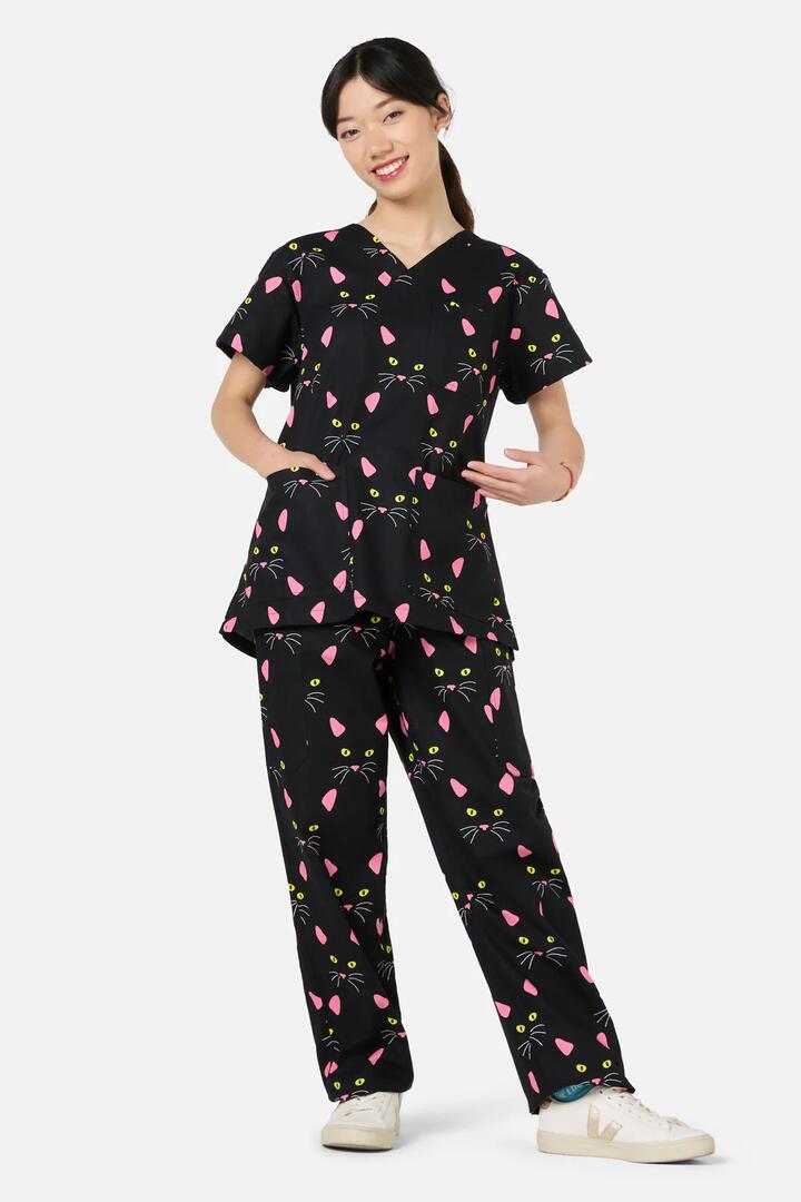 Image of a model wearing Uniforms & Workwear. Productname: Night Cat Scrub Set in Black colour by brand - Scrubs With Love