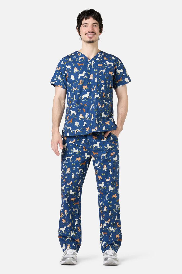 Image of a model wearing Uniforms & Workwear. Productname: Cute Dogs Scrub Set in Navy colour by brand - Scrubs With Love