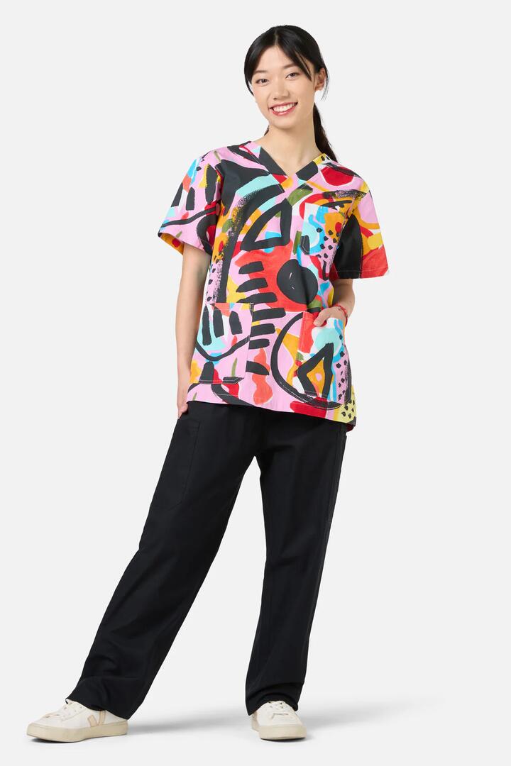 Image of a model wearing Uniforms & Workwear. Product name - Licorice Top & Pant Scrub Set in Multi colour by brand - Gorman