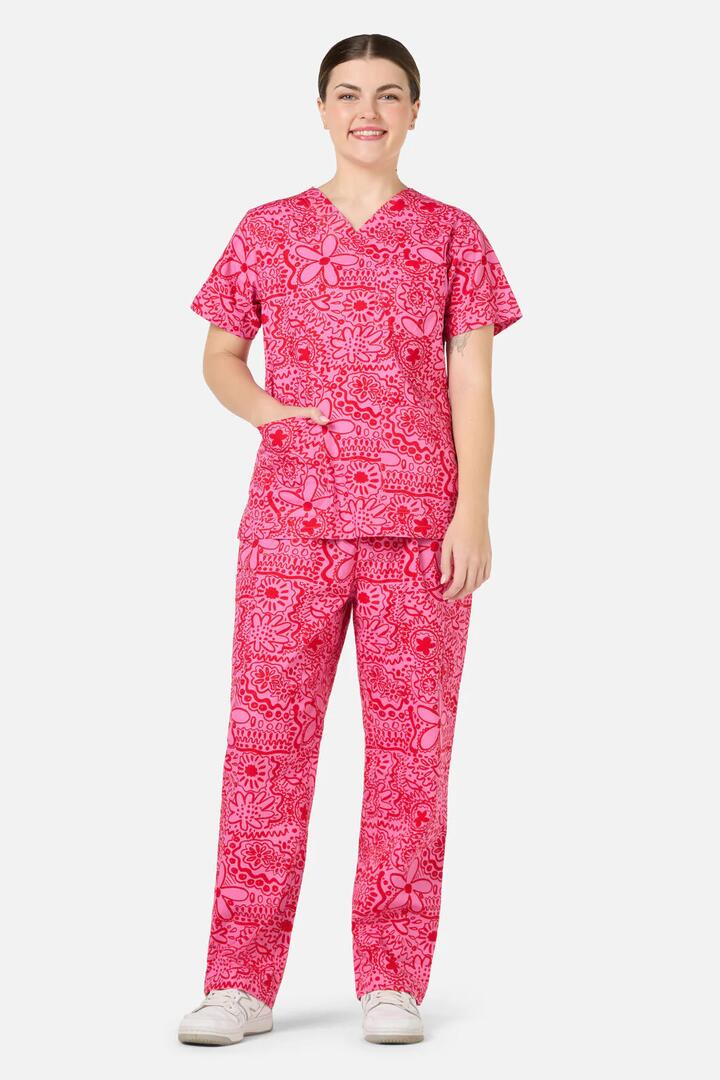 Image of a model wearing Uniforms & Workwear. Product name - Pink Daisy Mae Scrub Set in Pink colour by brand - Gorman