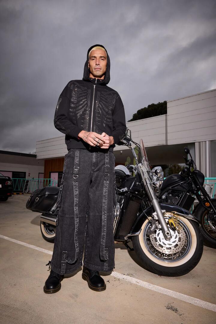 Image of a model wearing Outerwear. Productname: Skele Diamonte Zipper Hoodie in Black colour by brand - Dangerfield