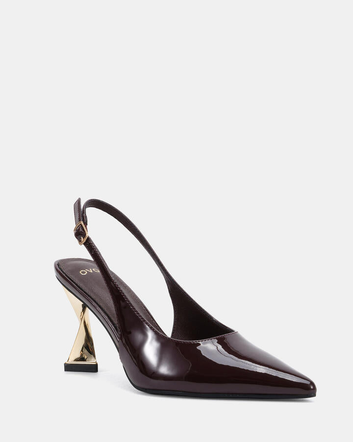 Image of Heels. Product name - Yashi Espresso Patent Vegan Heels in Espresso Patent colour by brand - Novo