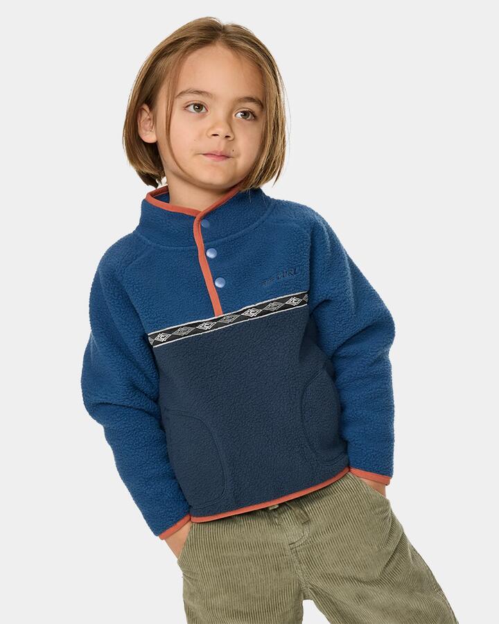 Image of a model wearing Outerwear. Product name - Rip Curl Boys 2-7 Heritage Polar Fleece Jumper Light Navy in Light Navy colour by brand - Rip Curl