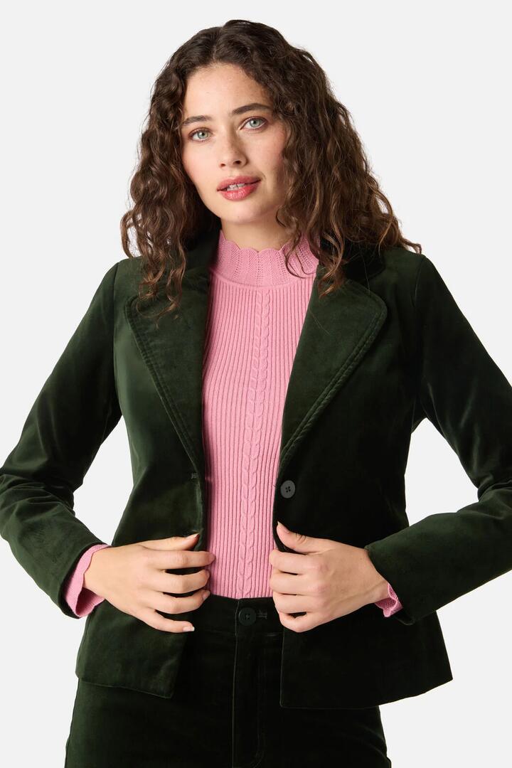 Image of a model wearing Outerwear. Product name - Rachel Velvet Blazer in Olive Green colour by brand - Princess Highway