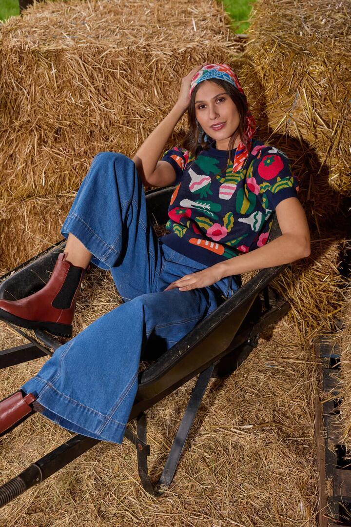 Image of a model wearing Tops. Product name - Garden Table Knit Top in Multi colour by brand - Gorman