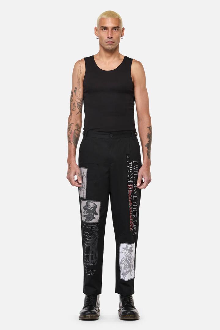Image of a model wearing Pants. Productname: Plague Doctor Patch Pants in Black colour by brand - Black Friday