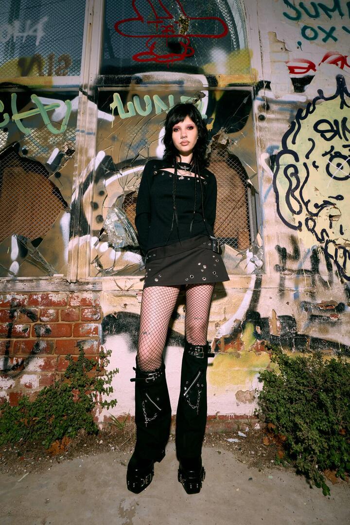 Image of a model wearing Skirts. Productname: Enamored Goth Skirt in Black colour by brand - Black Friday