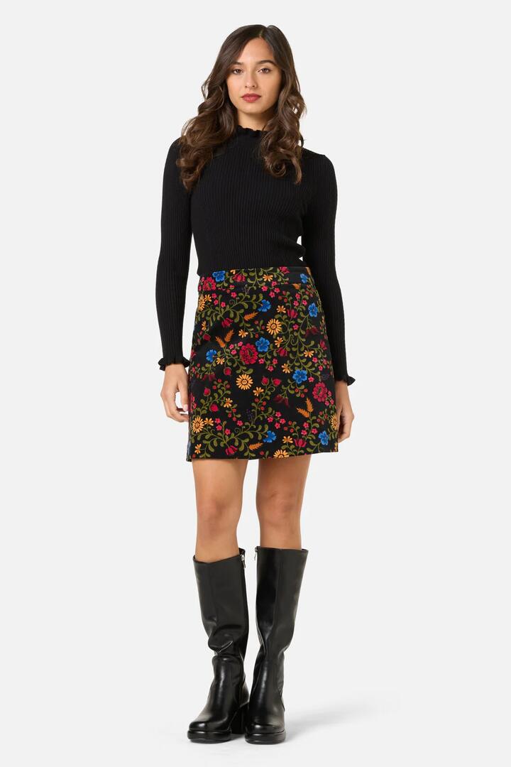 Image of a model wearing Skirts. Productname: Joelle Floral Velvet Skirt in Black colour by brand - Princess Highway