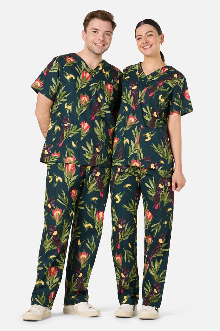 Image of a model wearing Uniforms & Workwear. Productname: Cockatoo & Protea Scrub Set in Teal colour by brand - Scrubs With Love