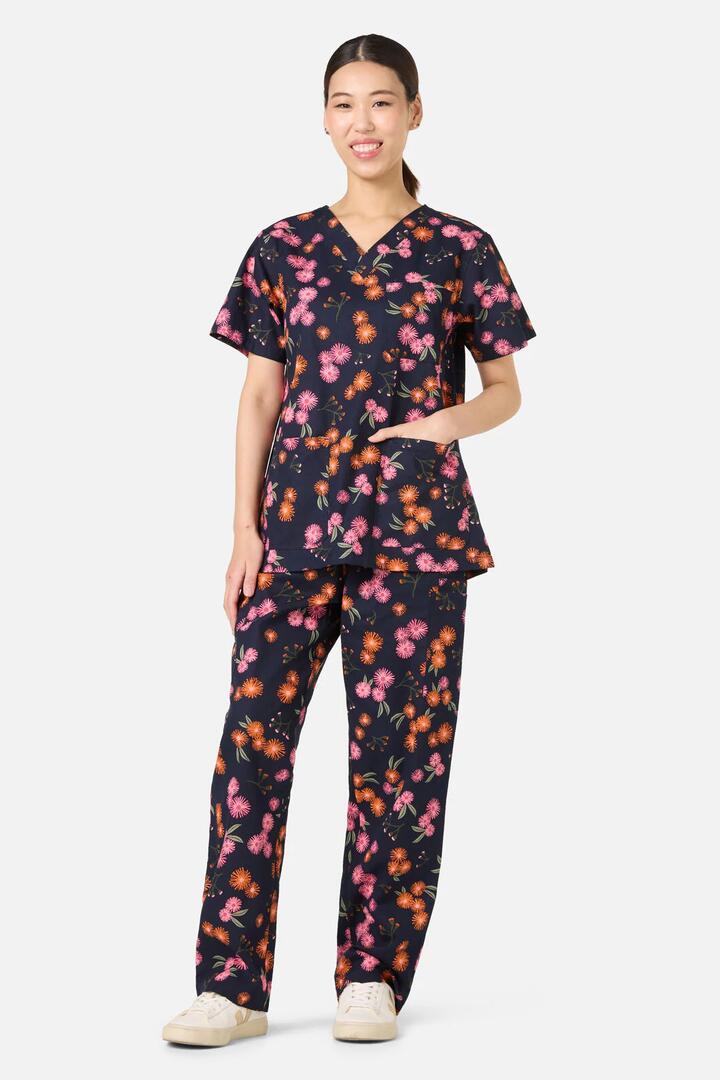Image of a model wearing Uniforms & Workwear. Productname: Gumnut Puffs Scrub Set in Navy colour by brand - Scrubs With Love