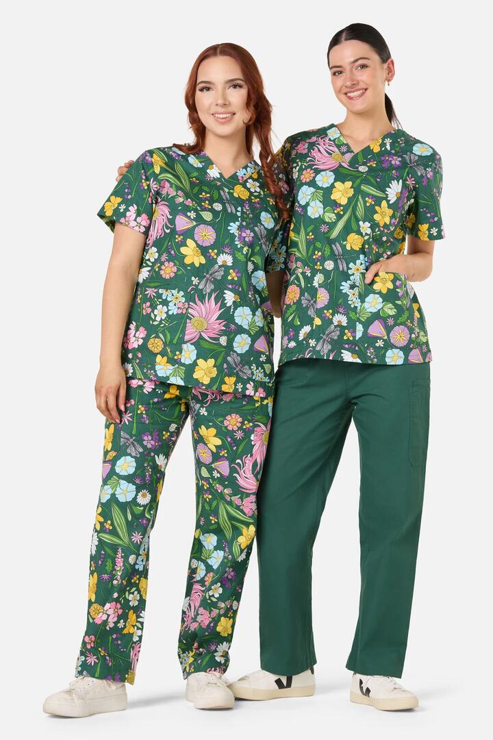 Image of a model wearing Uniforms & Workwear. Productname: Magical Garden Scrub Set in Green colour by brand - Scrubs With Love