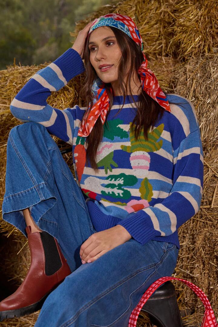Image of a model wearing Outerwear. Product name - Garden Table Wool Jumper in Multi colour by brand - Gorman