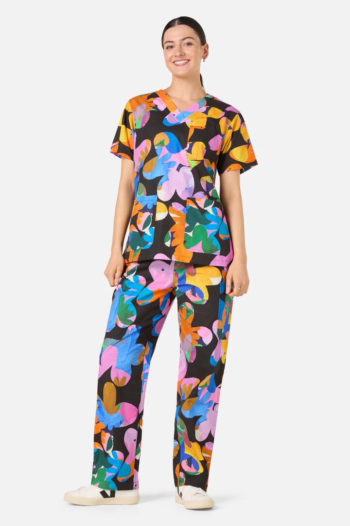 Image of a model wearing Uniforms & Workwear. Product name - Abstract Floral Scrub Set in Multi colour by brand - Gorman