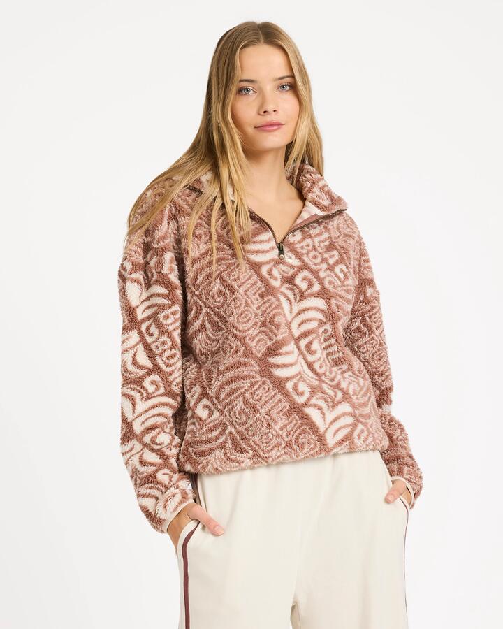 Image of a model wearing Outerwear. Product name - Billabong Womens Go For It Half Zip Fleece Jumper Brownstone in Brownstone colour by brand - Billabong