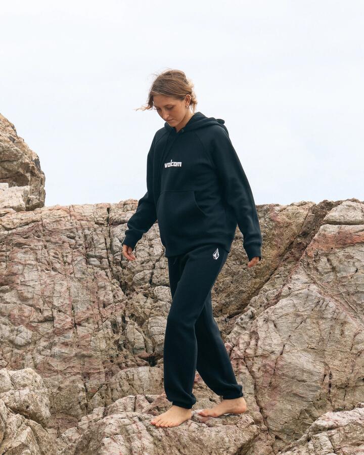 Image of a model wearing Pants. Product name - Volcom Womens Get More Trackpants Black in Black colour by brand - Volcom