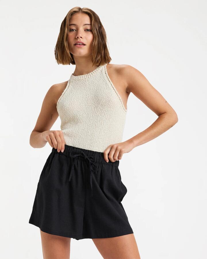 Image of a model wearing Shorts. Product name - Roxy Womens Place To Elastic Waist Shorts Anthracite in Anthracite colour by brand - Roxy