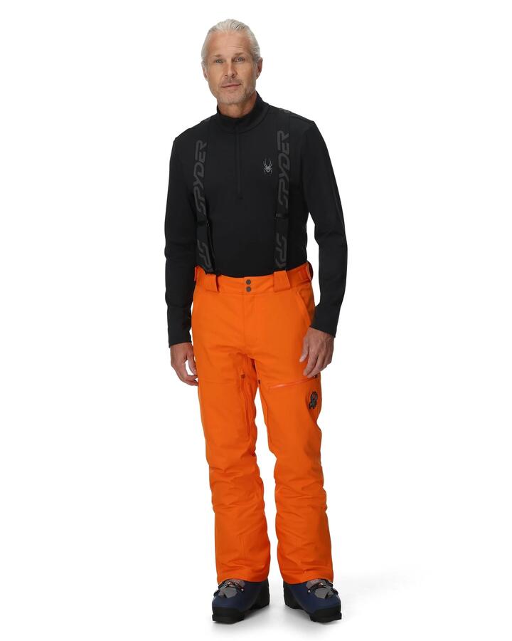 Image of a model wearing Pants. Product name - Spyder Dare Pants Flash Orange in Flash Orange colour by brand - Spyder