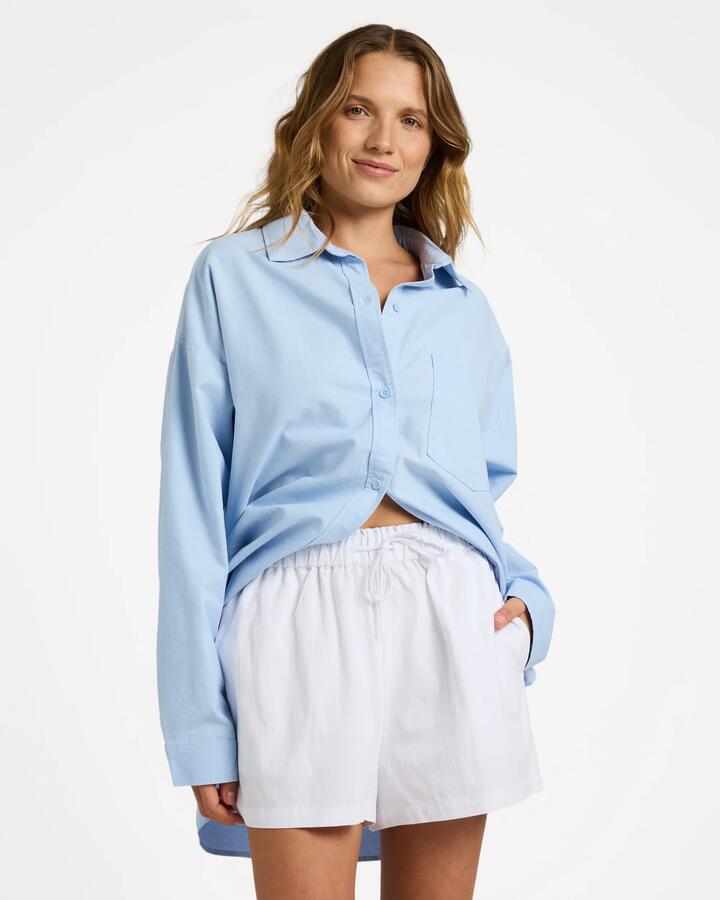 Image of a model wearing Tops. Product name - Roxy Womens Alltime Long Sleeve Shirt Windsurfer in Windsurfer colour by brand - Roxy