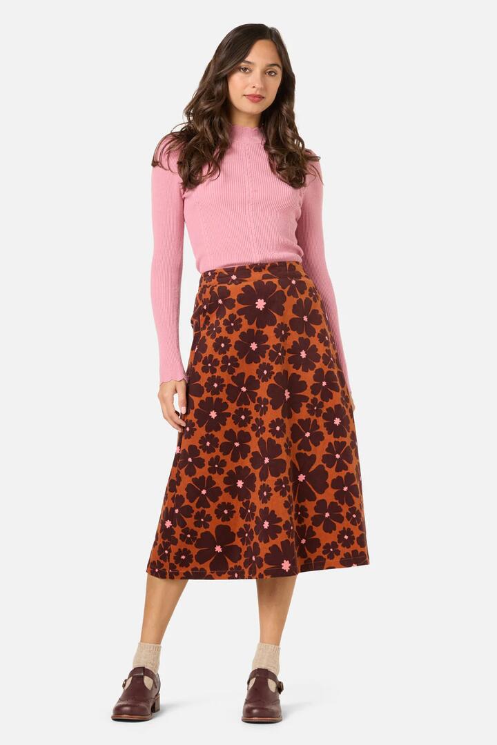 Image of a model wearing Skirts. Productname: Donna Flower Cord Skirt in Rust colour by brand - Princess Highway