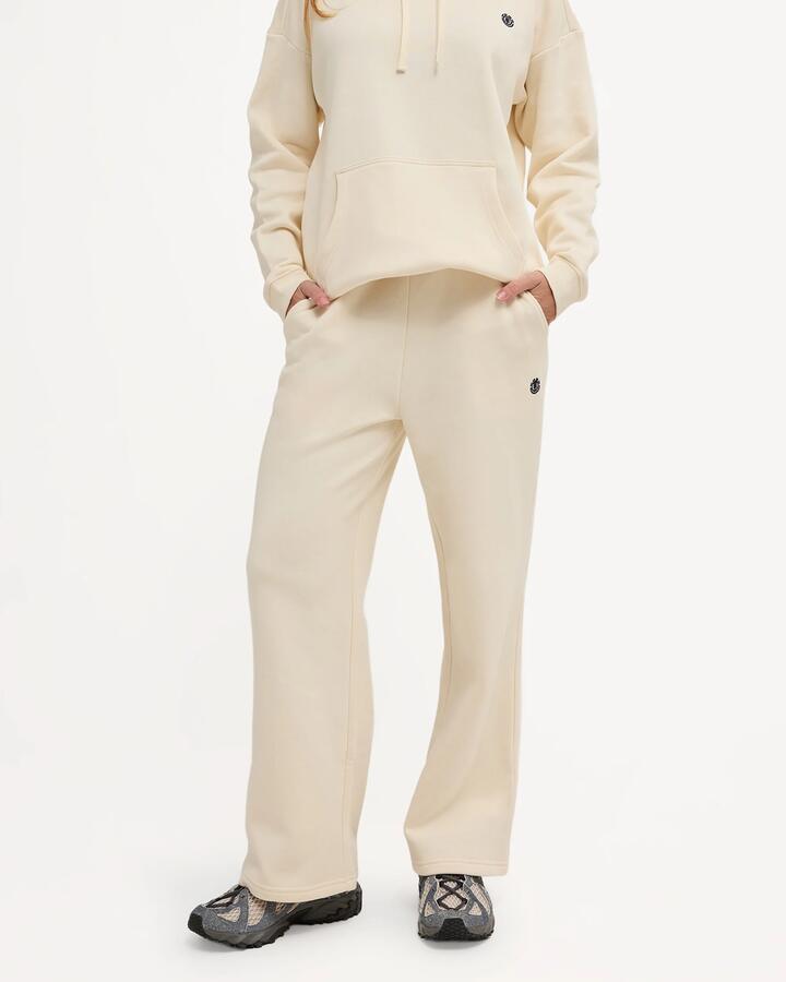Image of a model wearing Pants. Product name - Element Womens Cornette Wide Trackpants Off White in Off White colour by brand - Element