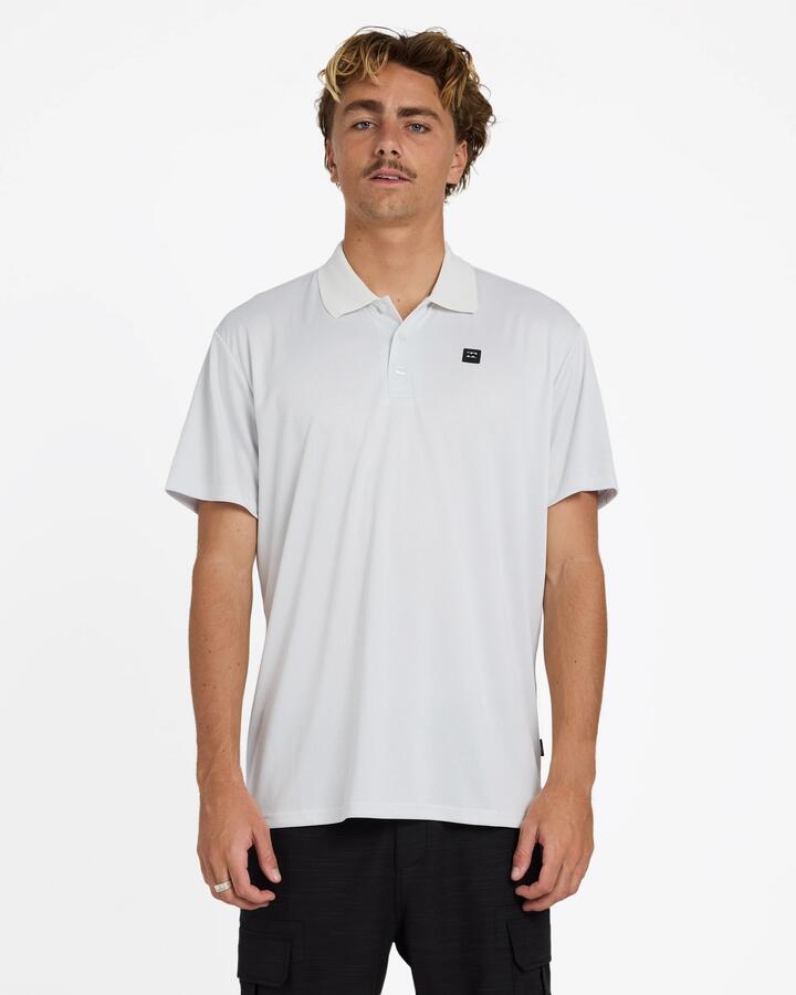 Image of a model wearing Shorts. Product name - Billabong Mens A/Div Short Sleeve Polo Shirt Grey Mist in Grey Mist colour by brand - Billabong