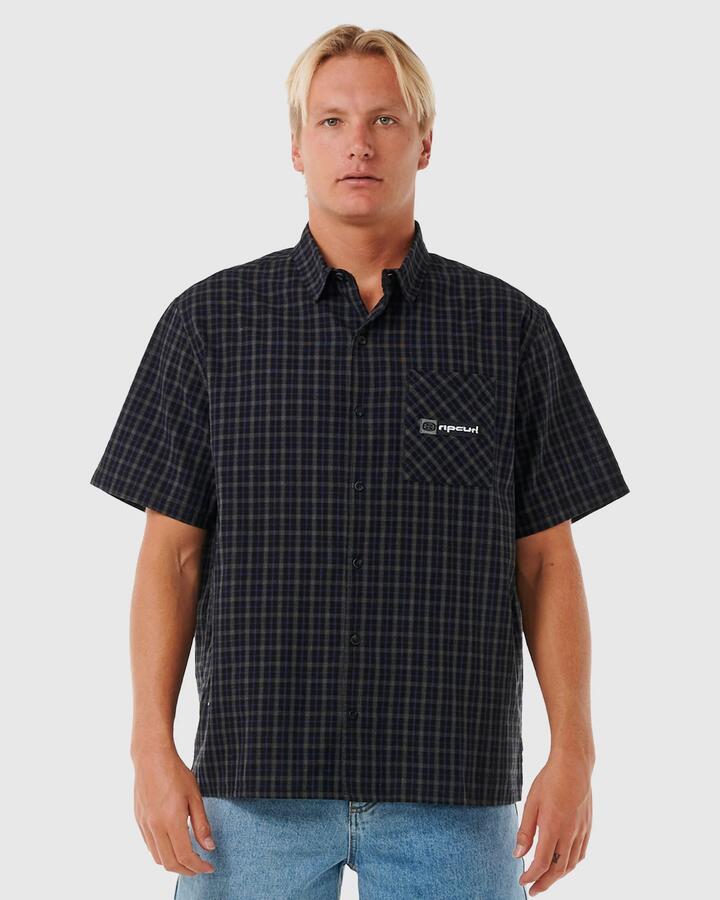 Image of a model wearing Tops. Product name - Rip Curl Mens Super Computer Short Sleeve Shirt Black in Black colour by brand - Rip Curl