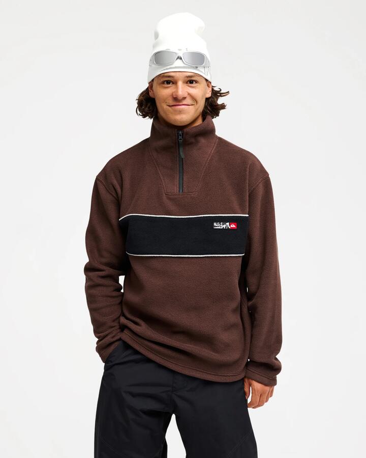 Image of a model wearing Outerwear. Product name - Quiksilver Mens Yg Cruz Polar Half Zip Fleece Java in Java colour by brand - Quiksilver