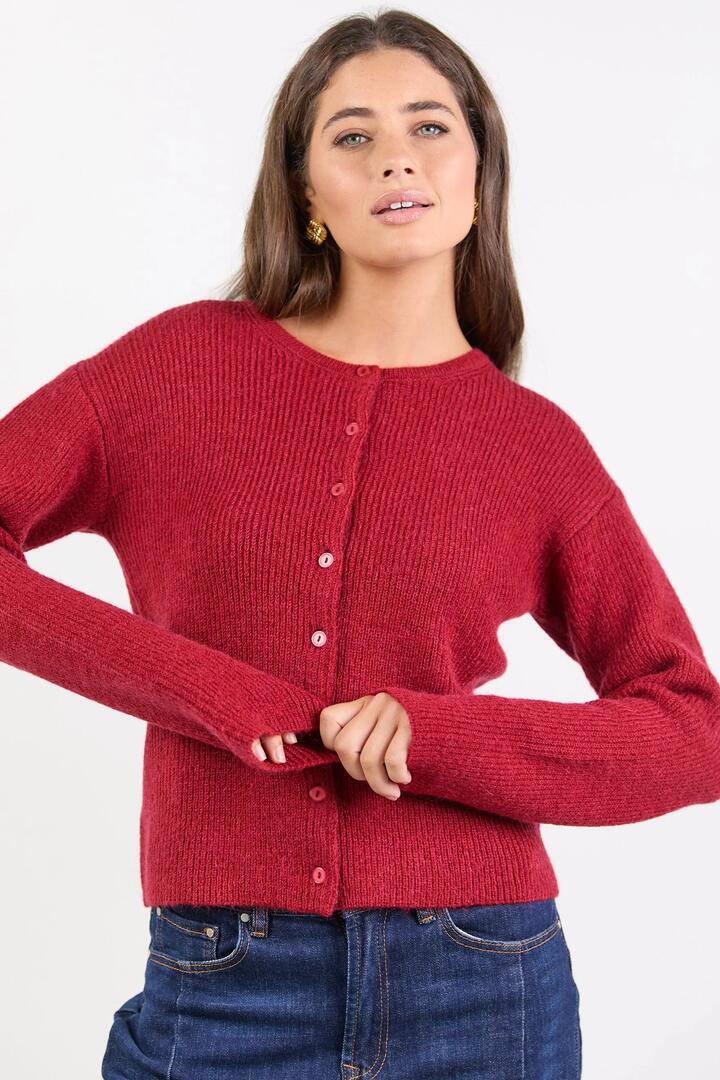 Image of a model wearing Outerwear. Product name - Daydream Red Crewneck Rib Fluffy Cardigan in Red colour by brand - Among the Brave