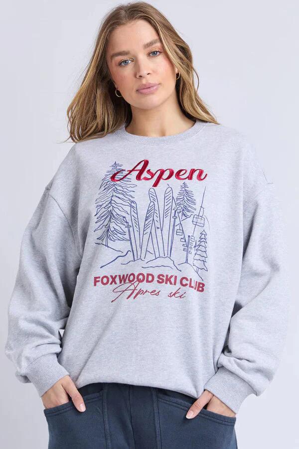 Image of a model wearing Outerwear. Product name - Ski Club Grey Marle Knit Crew Jumper in Grey colour by brand - Foxwood
